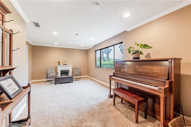 sitting room with light carpet, recessed lighting, baseboards, ornamental molding, and a fireplace
