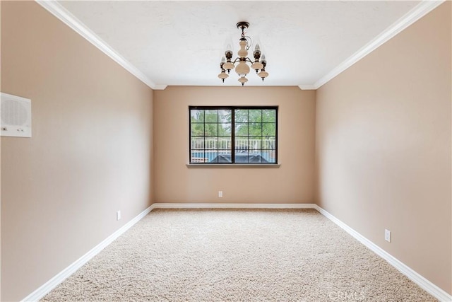 spare room with a chandelier, crown molding, light colored carpet, and baseboards
