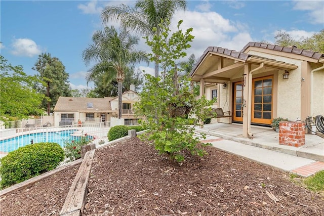 view of yard with fence and a patio area