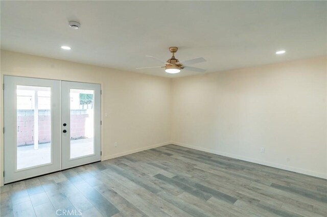 818 Invergarry St, Glendora, CA 91741 - unfurnished room featuring french doors, a ceiling fan, wood finished floors, a smoke detector, and recessed lighting