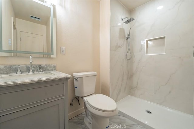 818 Invergarry St, Glendora, CA 91741 - full bathroom with marble look tiles, toilet, vanity, and a marble finish shower