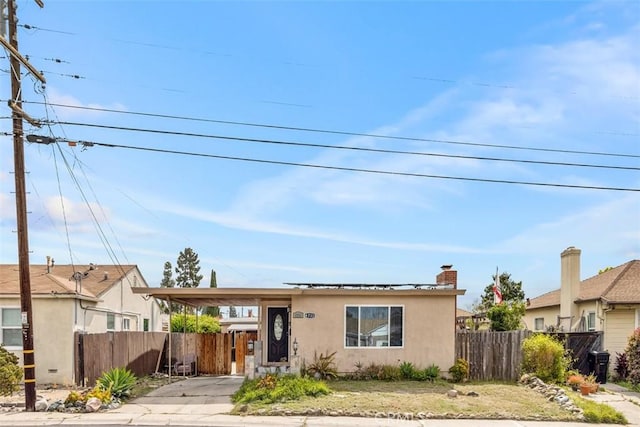 4731-33 Austin Dr, San Diego, CA 92115 - view of front of house featuring an attached carport, fence, stucco siding, and driveway