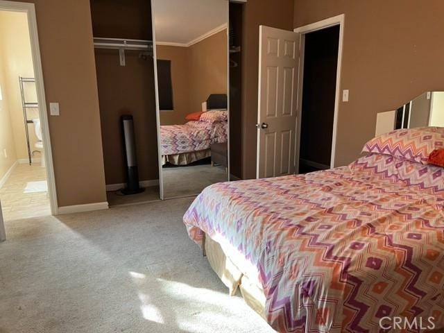 4731-33 Austin Dr, San Diego, CA 92115 - carpeted bedroom featuring baseboards, a closet, and crown molding