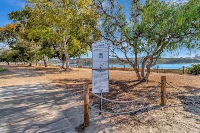 view of home's community featuring a water view