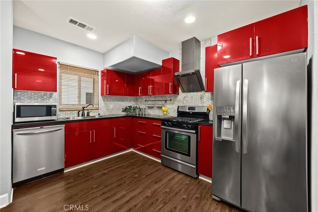 128 N Allen Ave Unit 1, Pasadena, CA 91106 - kitchen featuring stainless steel appliances, red cabinets, wall chimney range hood, and dark countertops