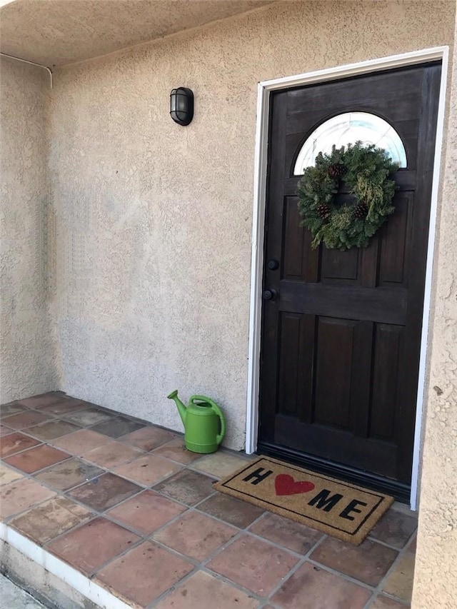 14253 Gilmore St Unit A, Van Nuys, CA 91401 - view of exterior entry featuring stucco siding