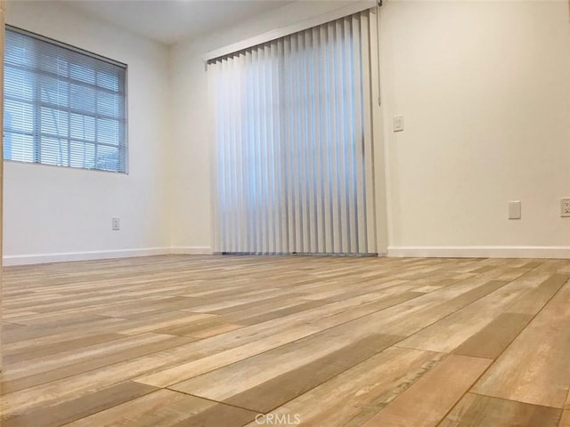 14253 Gilmore St Unit A, Van Nuys, CA 91401 - unfurnished room featuring light wood finished floors and baseboards