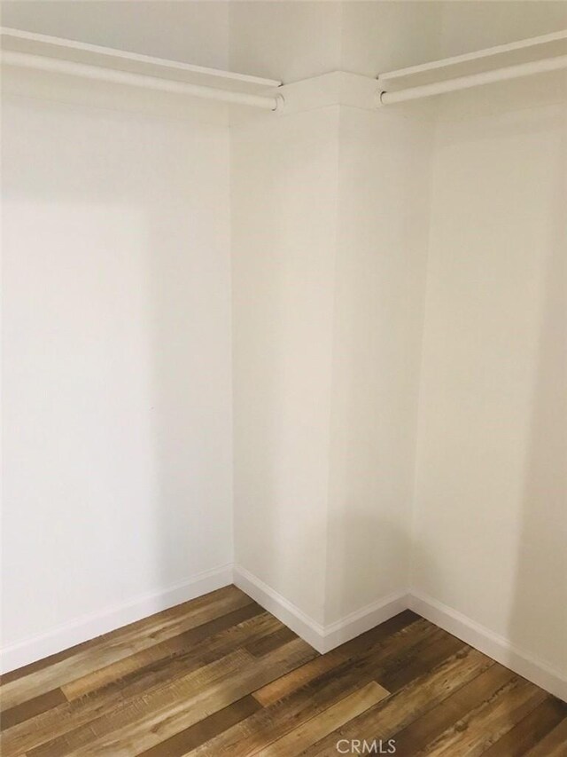14253 Gilmore St Unit A, Van Nuys, CA 91401 - spacious closet featuring dark wood finished floors