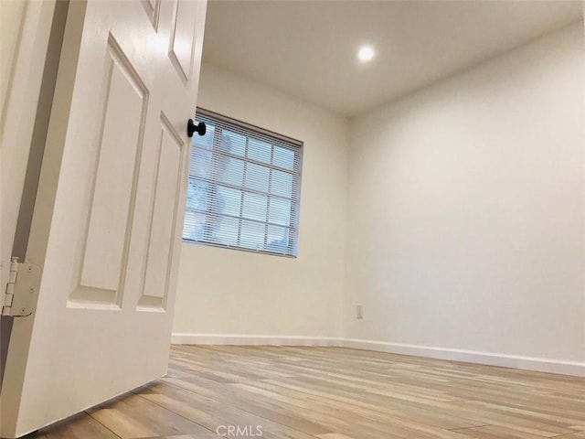 14253 Gilmore St Unit A, Van Nuys, CA 91401 - spare room featuring light wood finished floors, baseboards, and recessed lighting
