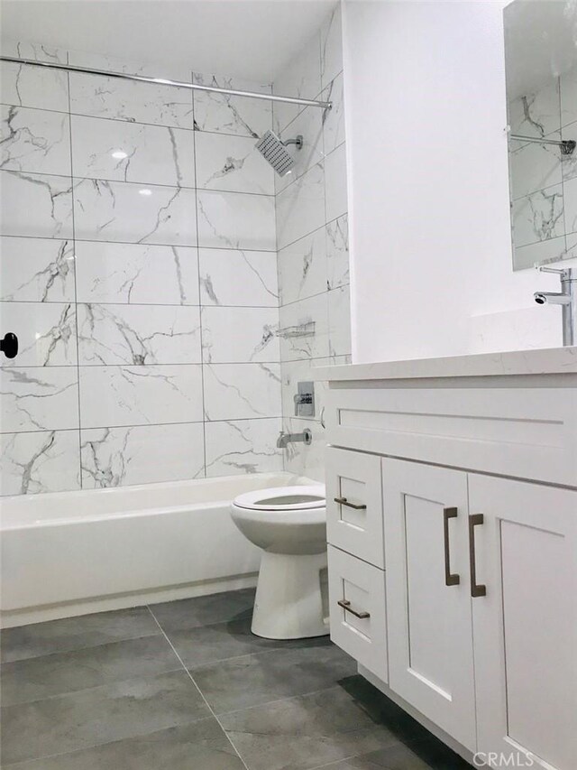 14253 Gilmore St Unit A, Van Nuys, CA 91401 - full bath featuring shower / bathtub combination, vanity, toilet, and marble finish floors