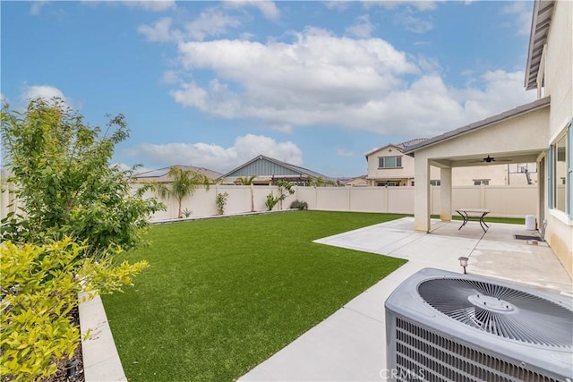29652 Falcon Hill Dr, Menifee, CA 92584 - view of yard featuring central air condition unit, a ceiling fan, and a patio