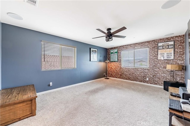 29652 Falcon Hill Dr, Menifee, CA 92584 - unfurnished room with brick wall, baseboards, a ceiling fan, and carpet floors