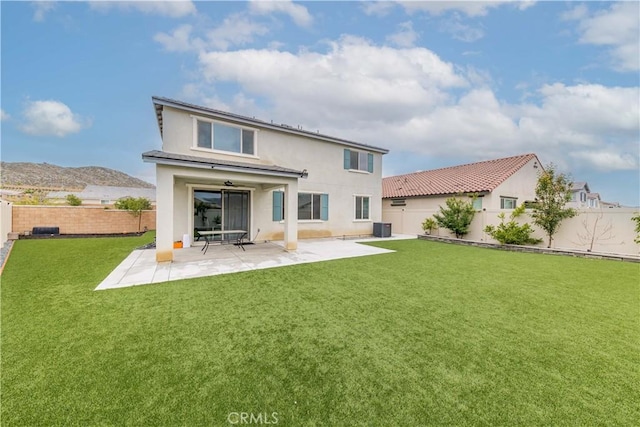 29652 Falcon Hill Dr, Menifee, CA 92584 - back of property featuring stucco siding, central AC unit, and a patio area
