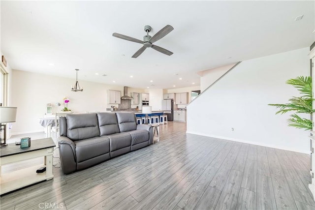 29652 Falcon Hill Dr, Menifee, CA 92584 - living area with a ceiling fan, light wood-style flooring, baseboards, and recessed lighting