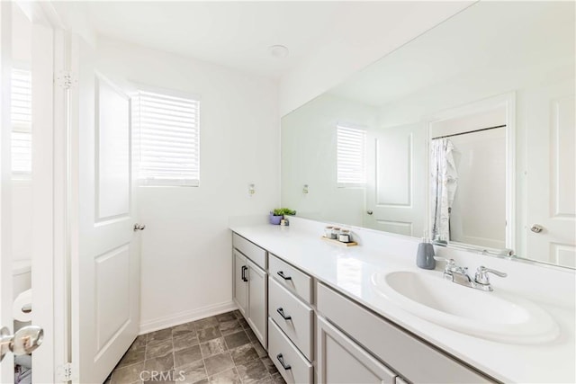 29652 Falcon Hill Dr, Menifee, CA 92584 - full bathroom featuring plenty of natural light, vanity, baseboards, and a shower with shower curtain