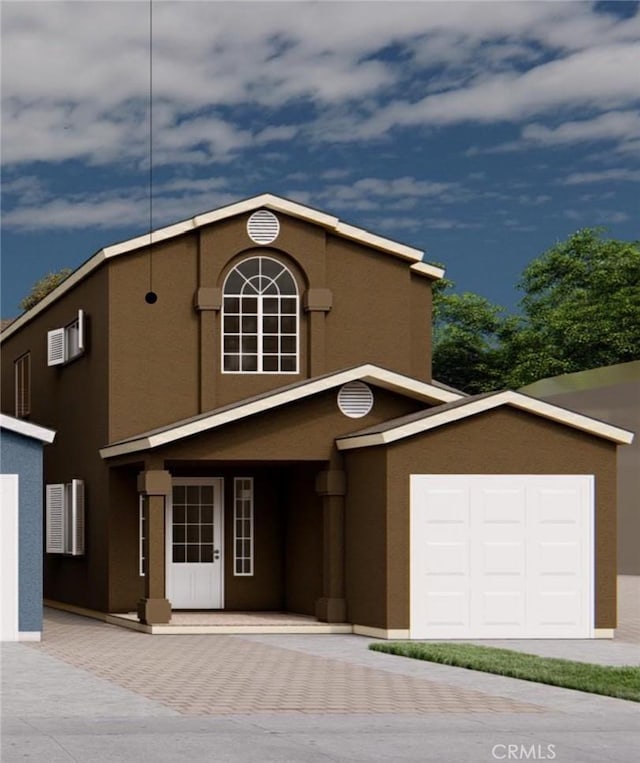 22024 Pioneer Blvd Unit A & B, Hawaiian Gardens, CA 90716 - view of front of home with stucco siding, a garage, and covered porch