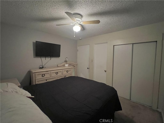 527 E King St, Rialto, CA 92376 - bedroom featuring a textured ceiling, light colored carpet, ceiling fan, and a closet