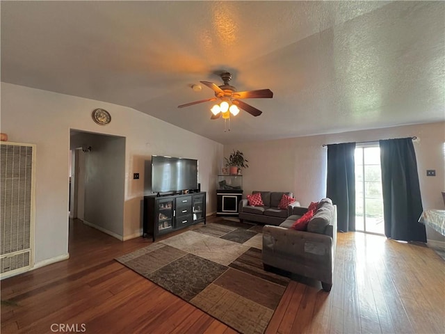 527 E King St, Rialto, CA 92376 - living area with a heating unit, hardwood / wood-style floors, ceiling fan, lofted ceiling, and baseboards
