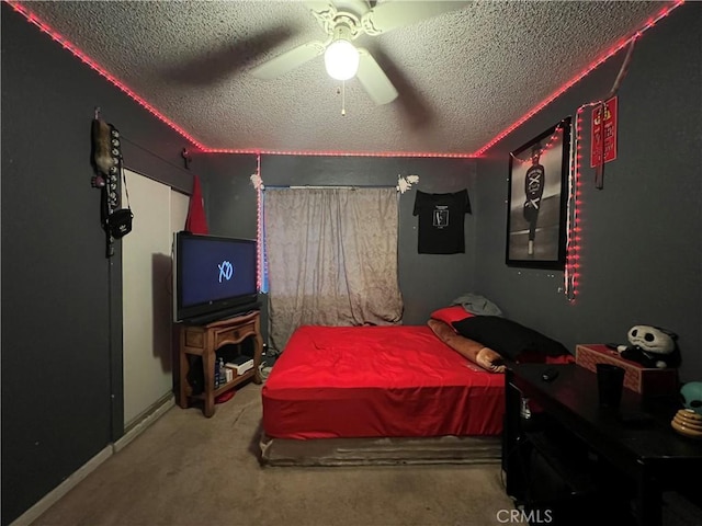 527 E King St, Rialto, CA 92376 - carpeted bedroom featuring a textured ceiling and ceiling fan