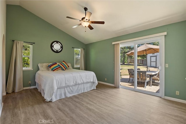 9 Benton Ave, Chico, CA 95973 - bedroom featuring access to exterior, wood finished floors, baseboards, high vaulted ceiling, and ceiling fan
