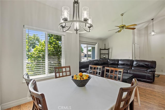 9 Benton Ave, Chico, CA 95973 - dining room with a chandelier, lofted ceiling, ceiling fan, wood finished floors, and baseboards