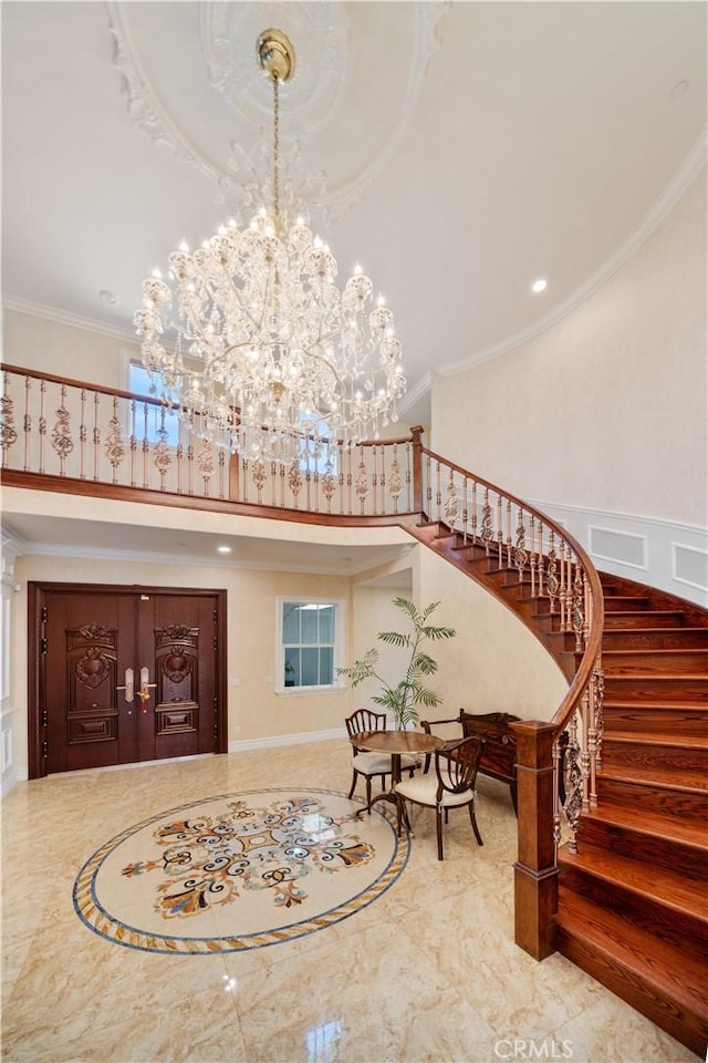 6829 Birmingham Dr, Chino, CA 91710 - entrance foyer with stairs, ornamental molding, marble tiled floors, a high ceiling, and a chandelier