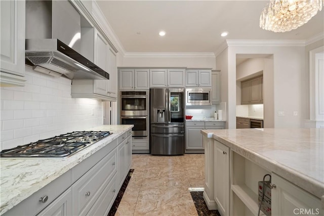 6829 Birmingham Dr, Chino, CA 91710 - kitchen featuring appliances with stainless steel finishes, wall chimney range hood, ornamental molding, backsplash, and a chandelier