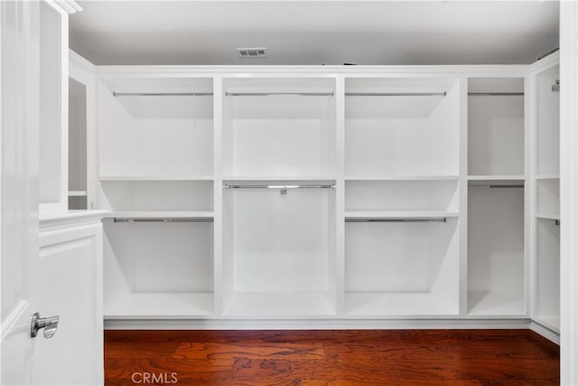6829 Birmingham Dr, Chino, CA 91710 - walk in closet featuring wood finished floors