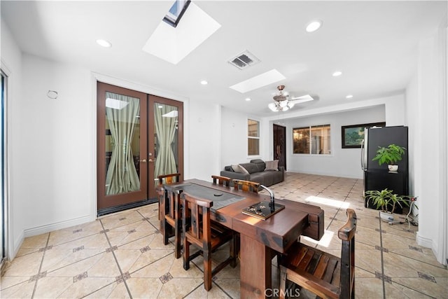 6829 Birmingham Dr, Chino, CA 91710 - dining space with a skylight, light tile patterned flooring, baseboards, recessed lighting, and french doors