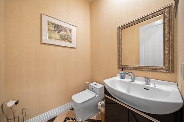 6829 Birmingham Dr, Chino, CA 91710 - bathroom with toilet and vanity