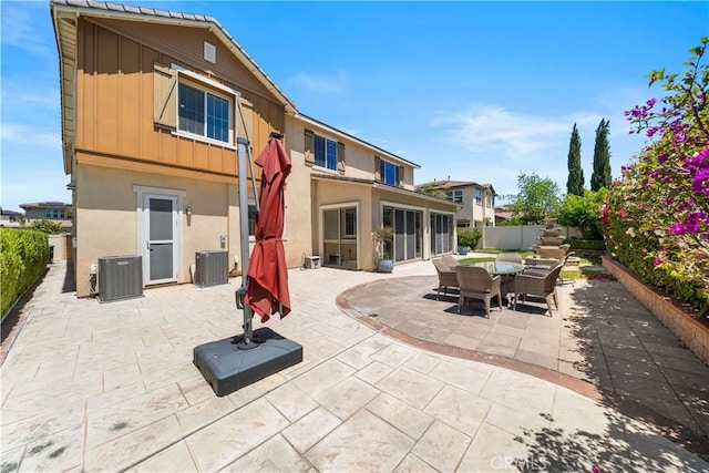 6829 Birmingham Dr, Chino, CA 91710 - view of patio featuring central AC and fence