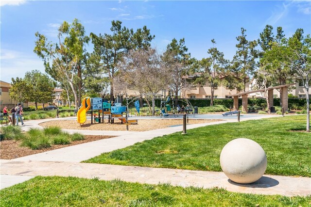 6829 Birmingham Dr, Chino, CA 91710 - community playground featuring a lawn