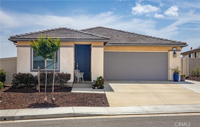 1559 Lismore Ln, Beaumont, CA 92223 - prairie-style home featuring driveway, an attached garage, stucco siding, and a tile roof