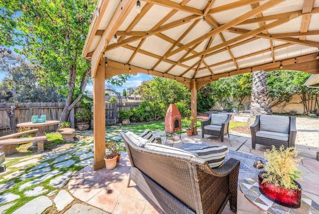 3221 Camarillo Ave, Oceanside, CA 92056 - view of patio / terrace with a gazebo, a fenced backyard, and an outdoor hangout area
