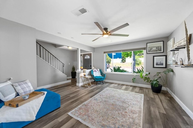3221 Camarillo Ave, Oceanside, CA 92056 - living area with ceiling fan, wood finished floors, stairway, and baseboards