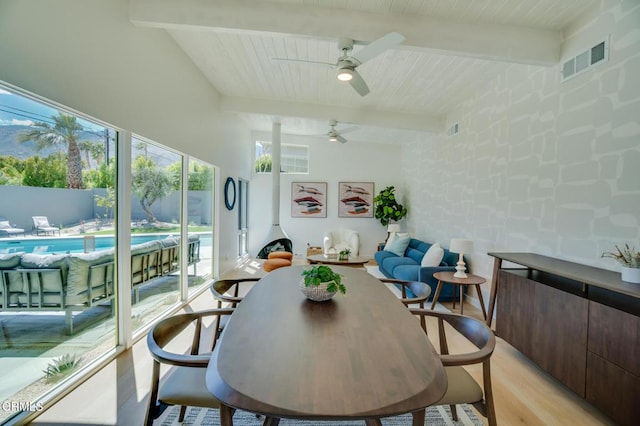 sunroom / solarium with beam ceiling
