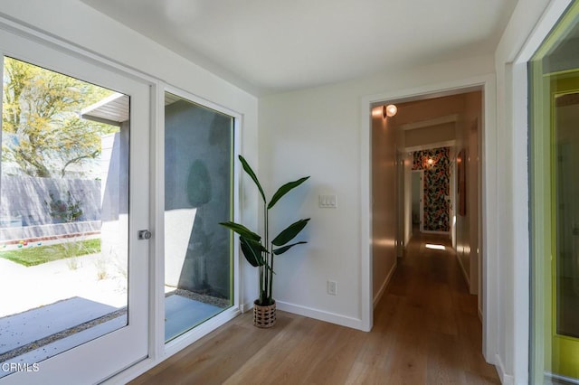 2839 N Davis Way, Palm Springs, CA 92262 - corridor featuring wood finished floors and baseboards