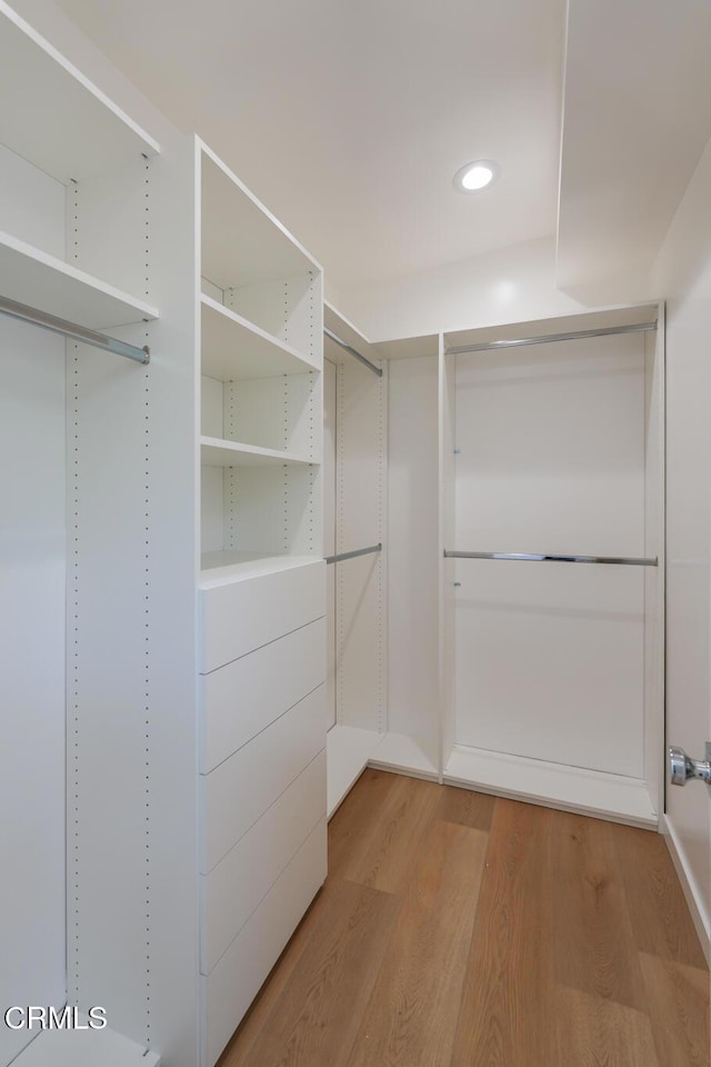 2839 N Davis Way, Palm Springs, CA 92262 - walk in closet featuring light wood-style flooring