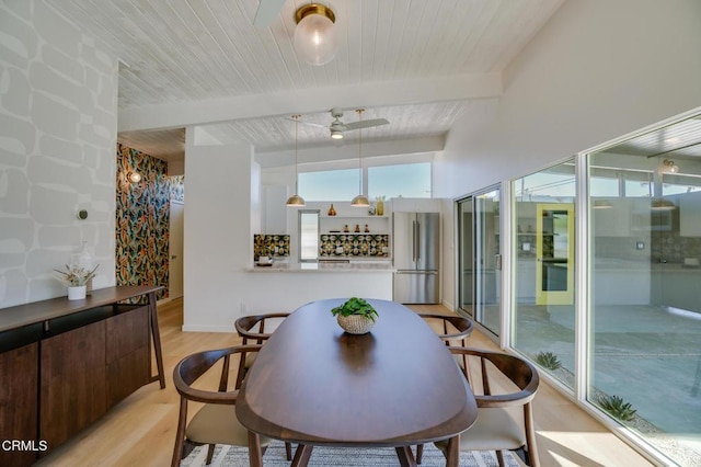 2839 N Davis Way, Palm Springs, CA 92262 - dining room featuring light wood-style floors, a wooden ceiling with exposed beams, and a ceiling fan