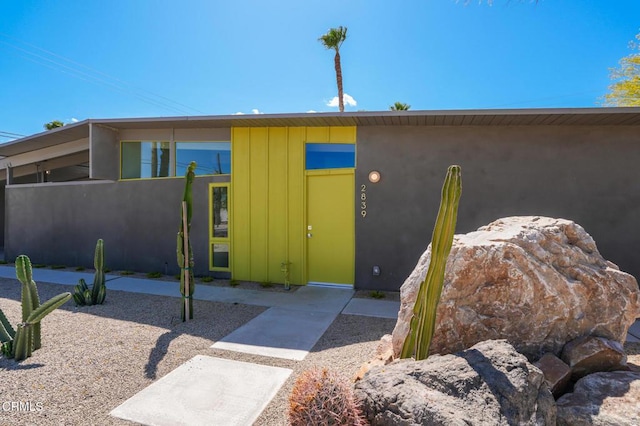 2839 N Davis Way, Palm Springs, CA 92262 - doorway to property with board and batten siding