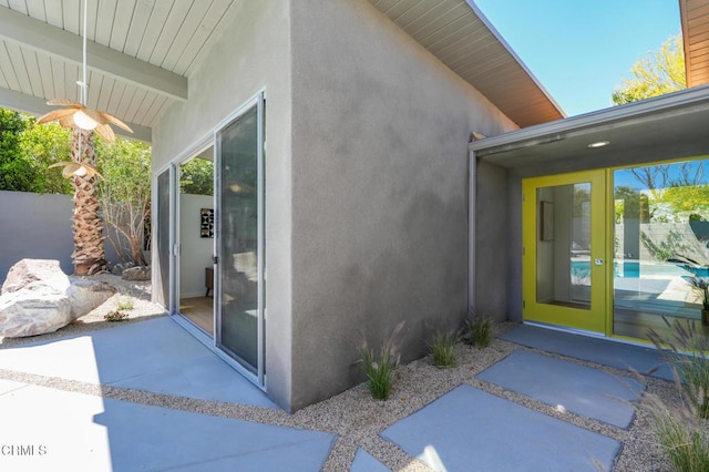 2839 N Davis Way, Palm Springs, CA 92262 - view of exterior entry featuring a patio area and stucco siding