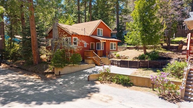 chalet / cabin featuring fence