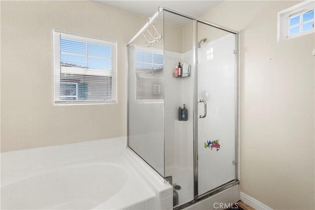 3818 Coastal St, Riverside, CA 92501 - full bathroom with a garden tub and a shower stall