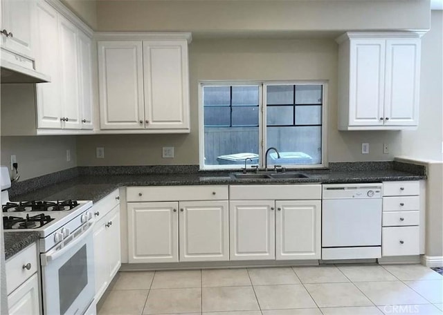 3818 Coastal St, Riverside, CA 92501 - kitchen with white appliances, a sink, under cabinet range hood, white cabinetry, and dark countertops