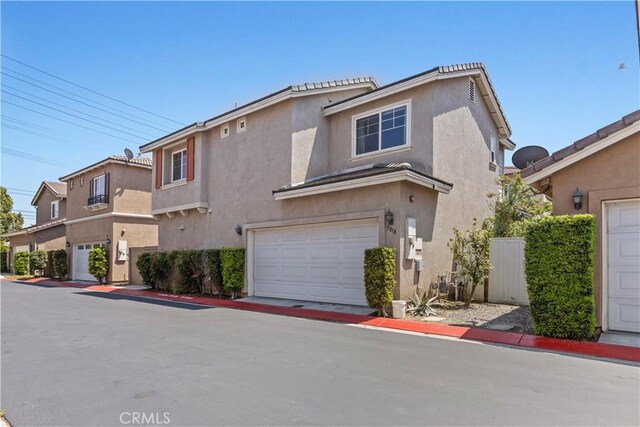 3818 Coastal St, Riverside, CA 92501 - multi unit property featuring stucco siding and an attached garage