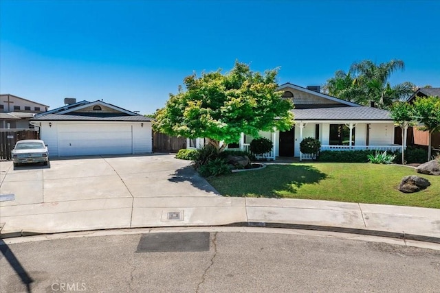 1995 E Valley Forge Ave, Tulare, CA 93274 - ranch-style home featuring driveway, covered porch, and an attached garage