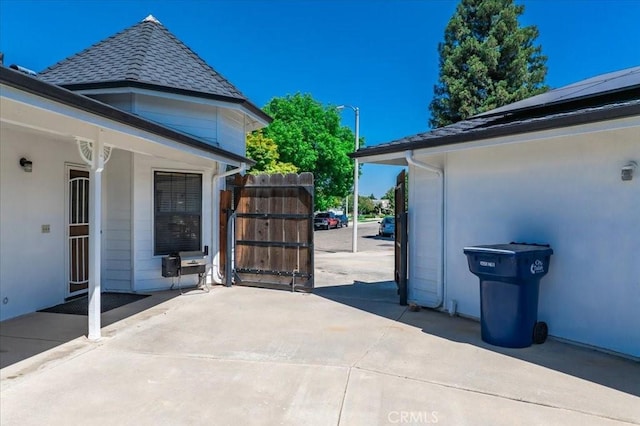 1995 E Valley Forge Ave, Tulare, CA 93274 - view of property exterior with a gate and a patio area