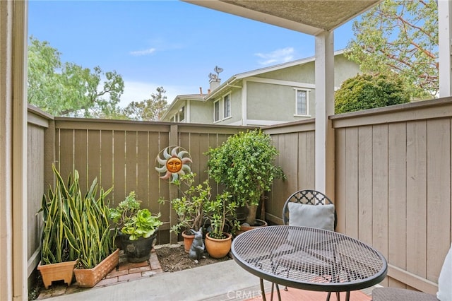 view of patio with fence