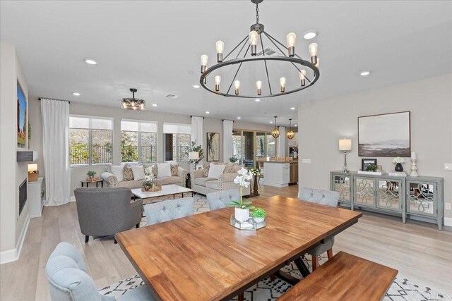 940 Lindbergh Dr, San Marcos, CA 92069 - dining space featuring a chandelier, light wood-style flooring, and recessed lighting