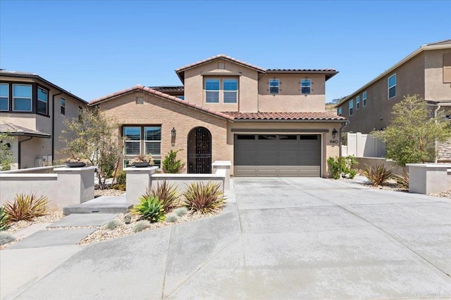 940 Lindbergh Dr, San Marcos, CA 92069 - view of front of property featuring a fenced front yard, a tile roof, a garage, concrete driveway, and stucco siding